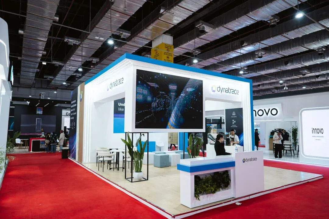 A sleek Dynatrace booth shining bright on the red carpet, showcasing innovation in style.