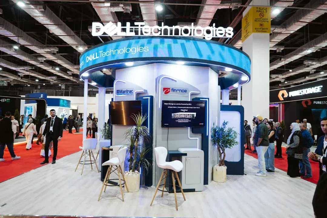 A vibrant DELL booth capturing attention with dynamic visuals and bold branding.