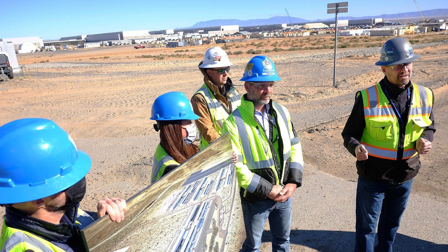 Project managers discuss the Facebook Los Lunas Data Center construction. Image: Alamy