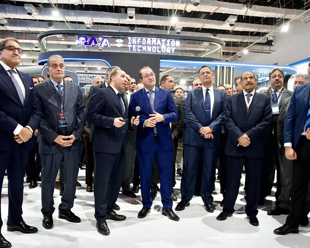 Officials touring the exhibition at the Raya Information Technology stand, AIDC² Expo 2025