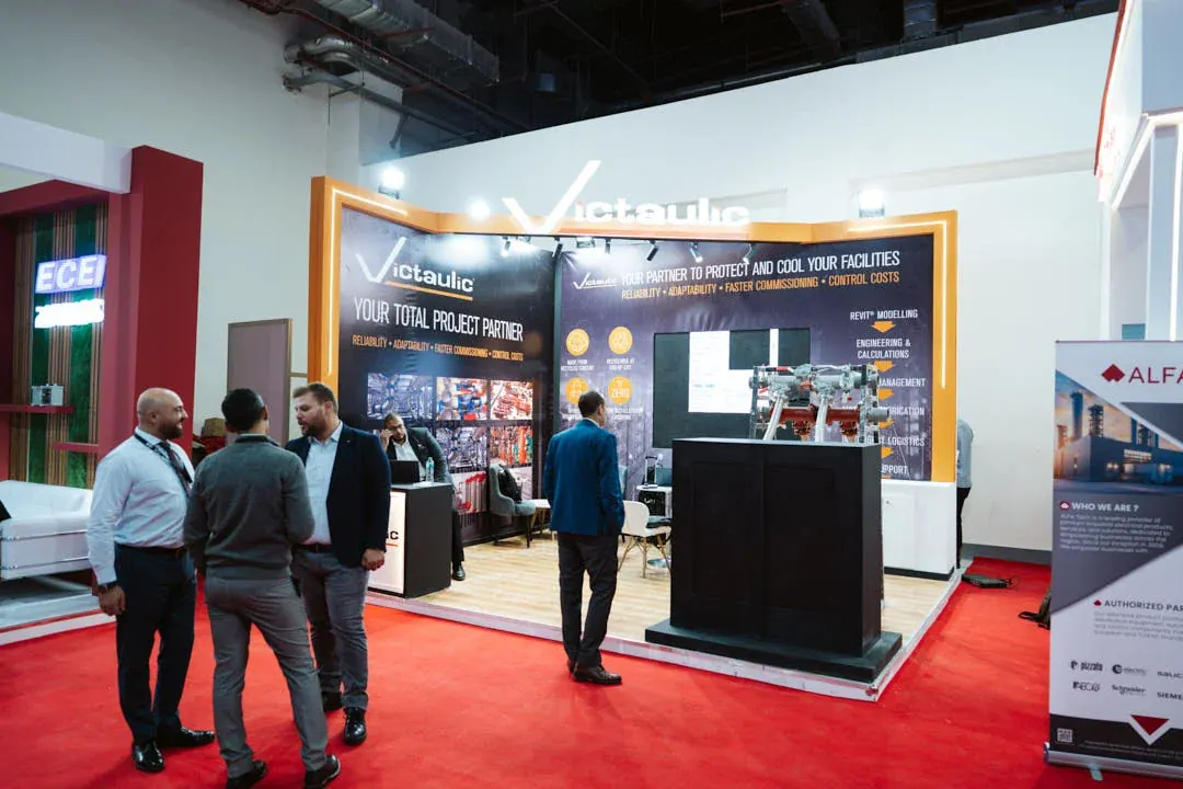 A vibrant Victaulic booth capturing attention with dynamic visuals and bold branding.